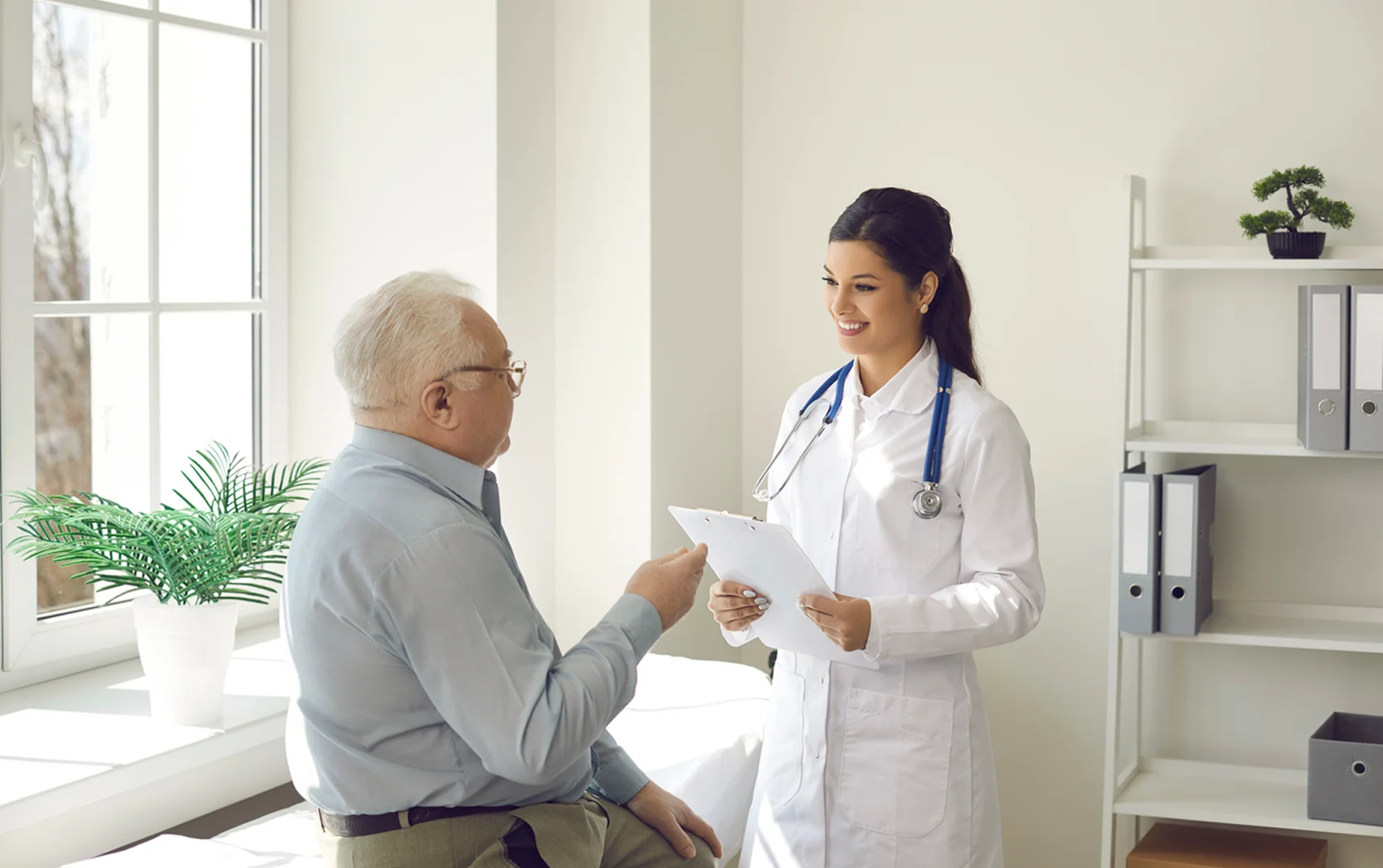 Primary care doctor with patient